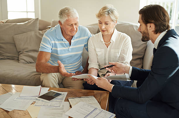 istock Giving his clients the information they need for retirement 629580128