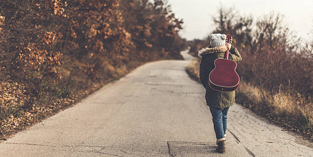istock Walking away with my guitar 629582696