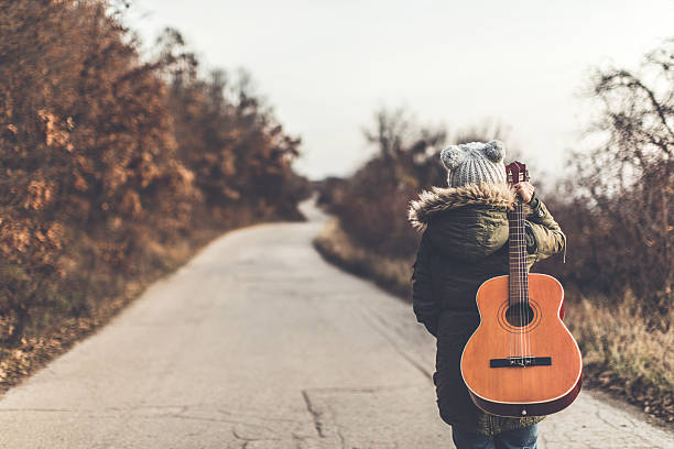 istock Walking away with my guitar 629582964