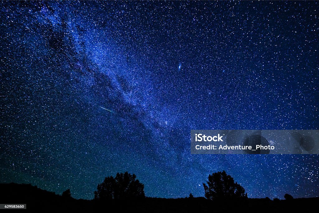 Perseid Meteor Shower Perseid Meteor Shower - Milky Way galaxy and stars at night during summer meteor shower. Perseids Stock Photo