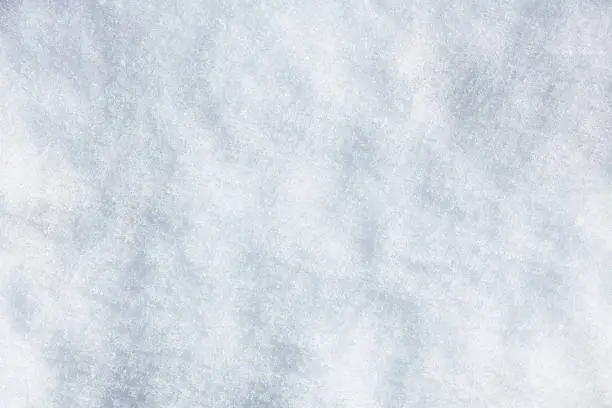 A snow surface background seen from above.