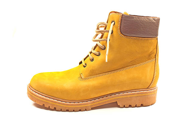 istock New yellow winter boot isolated on white 629589518