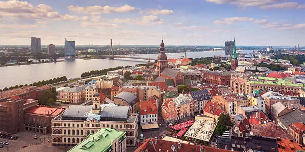 A view over the old town of Riga, Latvia, with the Daugava River in the background.