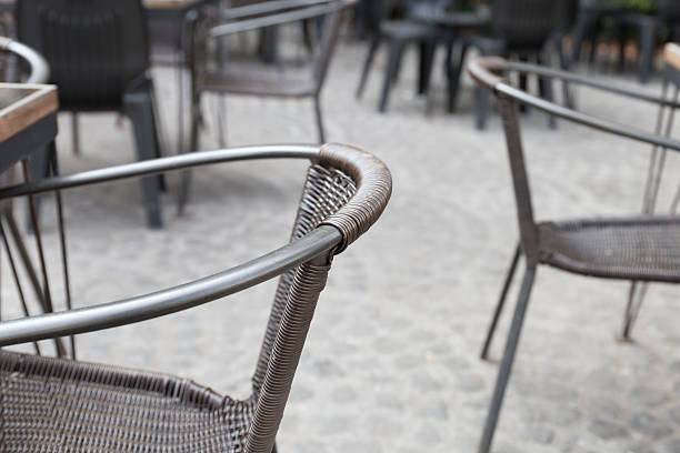 istock brown wicker chair and table on terrace 629589842