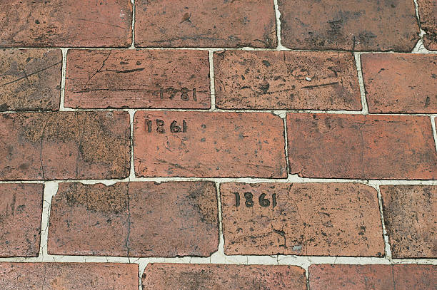 istock Brick Walkway Etched With Year 1861 and 1981 629592644