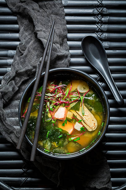 istock Delicious miso soup with salmon in black bowl 629601268