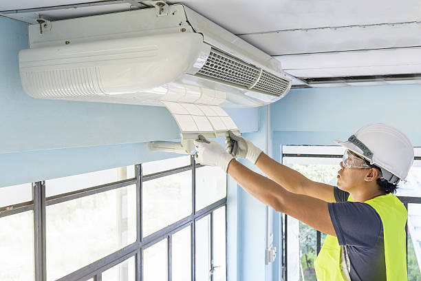 istock Technician do cleaning investigate Repairing Air Conditioner 629602222