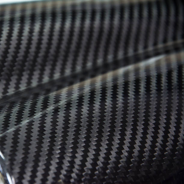 istock Carbon fiber composite raw material background 629602656