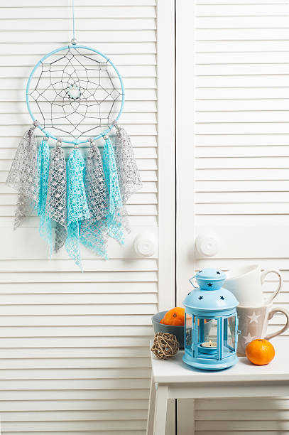 istock Blue grey dream catcher with crocheted doilies 629603300