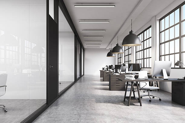 istock Front view of a long office with concrete floor 629604082