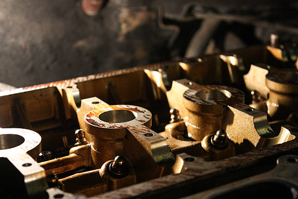 istock Engine of four cylinder petrol engine. Head in the workshop. 629605618