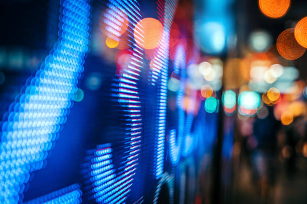 istock display stock market numbers and graph 629605718