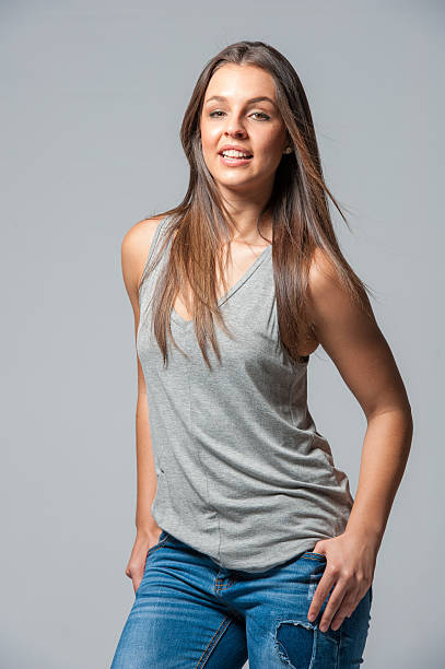 istock brunette femal on a grey background 629611258