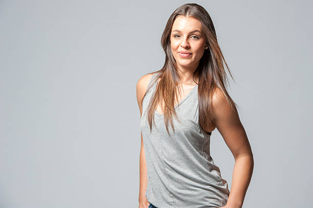istock brunette femal on a grey background 629611374
