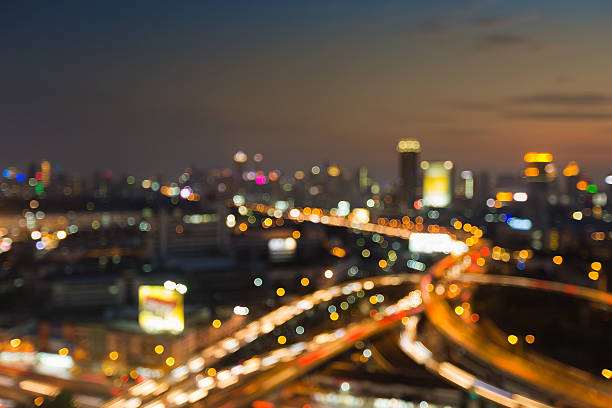 istock Blurred lights city downtown background after sunset 629611630