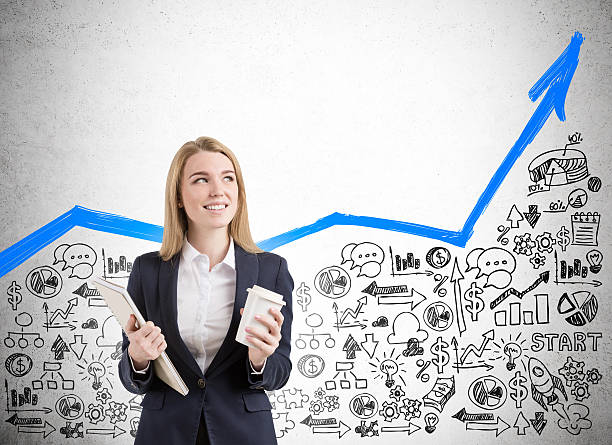 istock woman with coffee and notebook 629612124