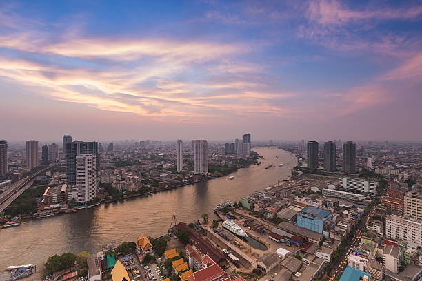 istock Aerial view Bangkok city river curved with dramatic sky 629614450