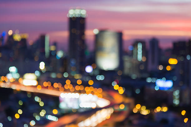 istock Abstract blurred lights city downtown and highway interchanged 629615120
