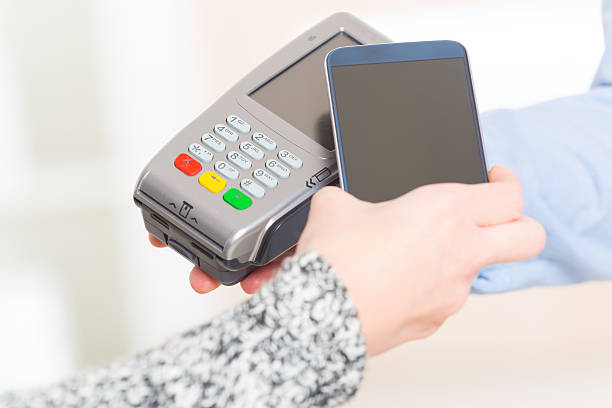 istock Paying contactless with smart phone 629615496