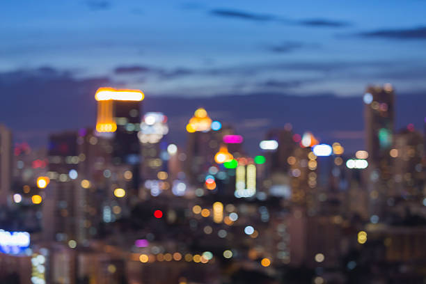 istock City office building blurred lights, abstract background 629617128