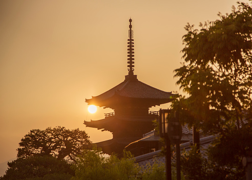 Kyoto, Japan - May 27, 2016: Toji Buddhist Temple, the oldest wooden tower temple in Kyoto, lit by the sun.
