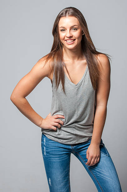 brunette femal on a grey background