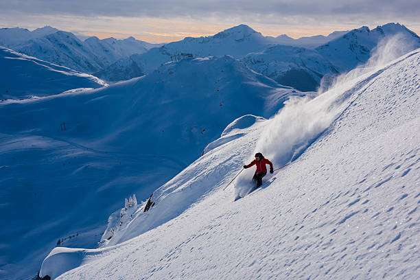 istock Female athlete making a powder turn 629628492