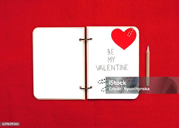 Opened Blank Notepad On Red Background Valentines Hart Stock Photo - Download Image Now