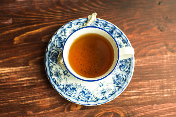 istock cup of tea on  wooden background 629640518