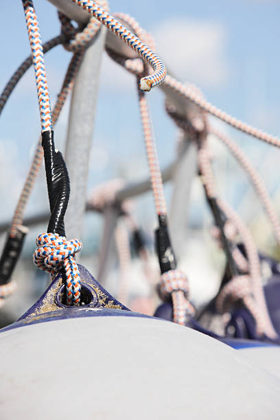 istock Nautical Bumper Buoy Floats Tied Rope Knots 629640738