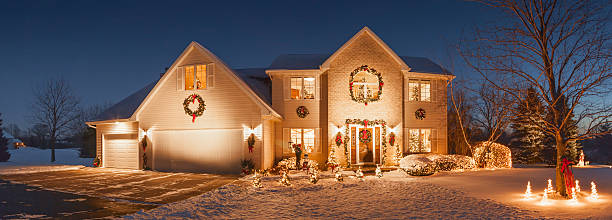 istock Special holiday decorated home with evening Christmas lighting, fluffy snow 629652982