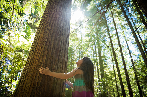 Young girl connecting with nature