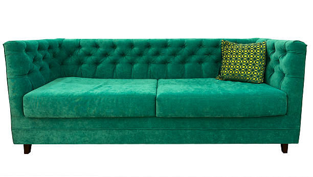 istock Green sofa with pillow. Soft emerald couch. Classic divan on 629655988