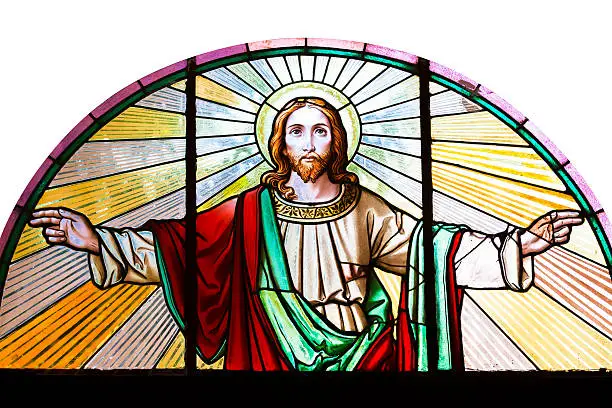 Stained glass window from 1854 of Jesus Christ with his arms outstretched, artist unknown, Czech Republic, full frame square composition, clipping path and copy space includedStained glass window from 1854 of Jesus Christ with his arms outstretched, artist unknown, Czech Republic, full frame square composition, clipping path and copy space included