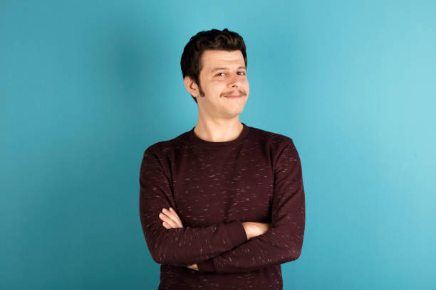 istock Smiling man with crossed arms 629665834