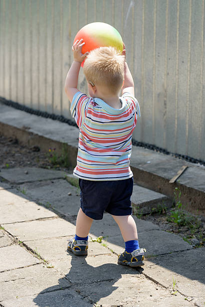 istock Hearing impaired boy walks with a ball 629666634