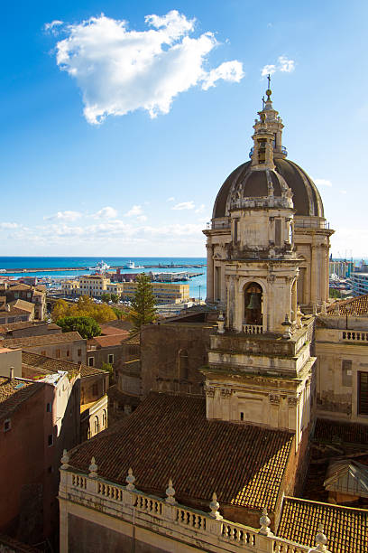 istock Catania, Sicily: Old Town Panorama with Cathedral Cupola and Sea 629668466
