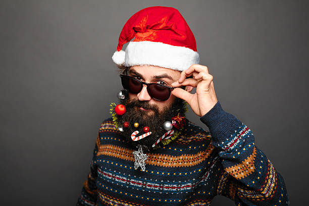 istock man in Santa hat and sunglasses 629668700