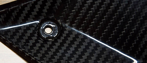 istock Carbon fiber composite raw material background 629675254