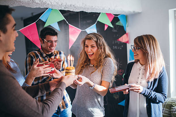 Surprise for birthday on work place Colleagues celebrating birthday party in the office woman birthday cake stock pictures, royalty-free photos & images