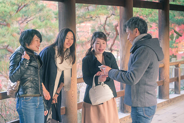 istock Taking a commemorative photo women at Tofukuji-Temple, Kyoto 629679528