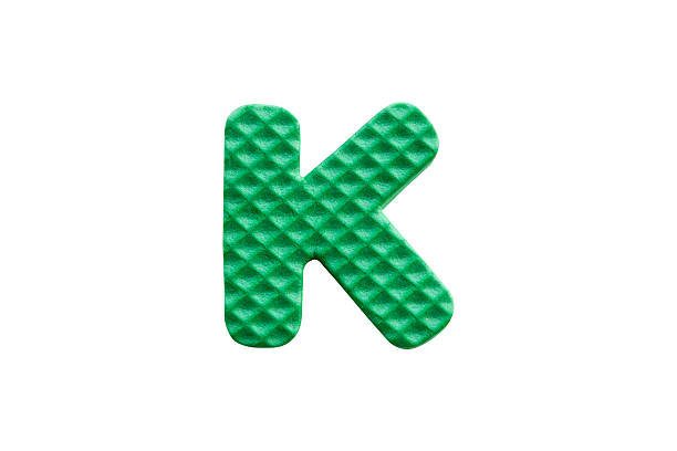 istock green alphabet K made from EVA foam on white background 629680248