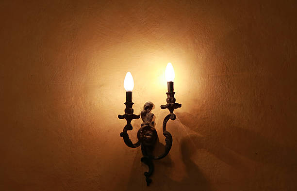istock Electric wall lamp, Electric candle on wall 629687248