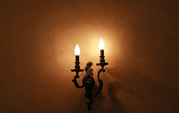 istock Electric wall lamp, Electric candle on wall 629687302