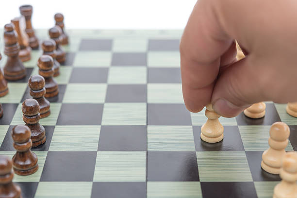 istock white Pawn of chess moving forward 629689294