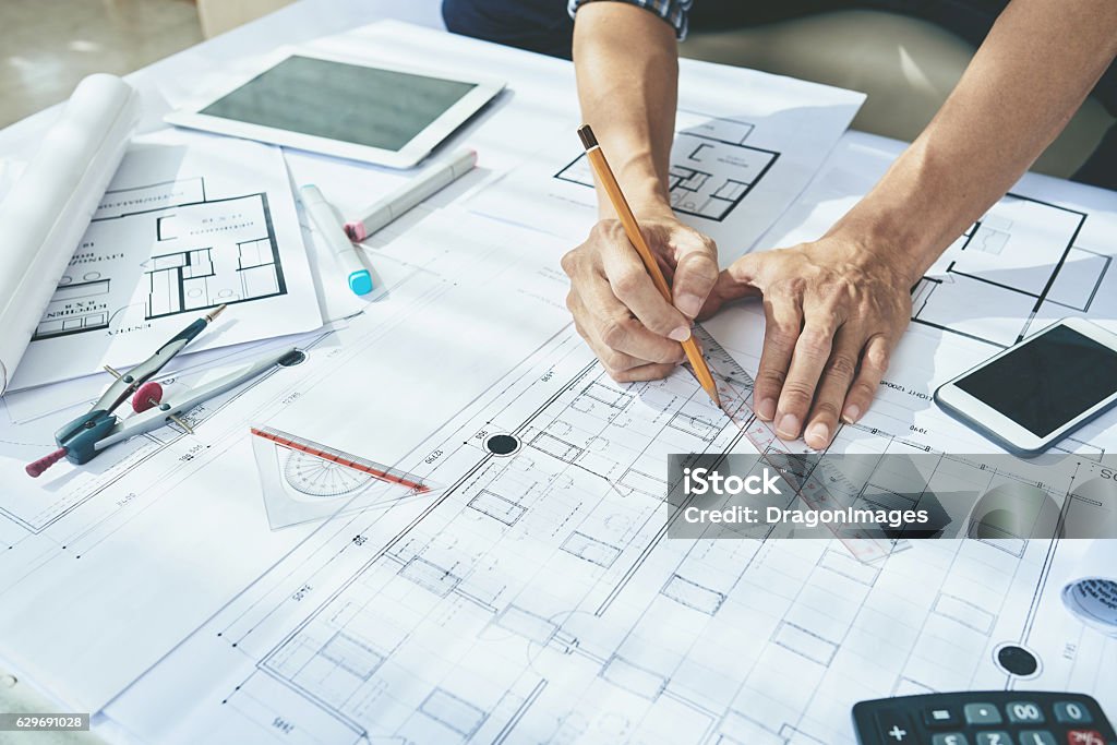 Drawing blueprint Close-up image of engineerr drawing blueprint Architect Stock Photo