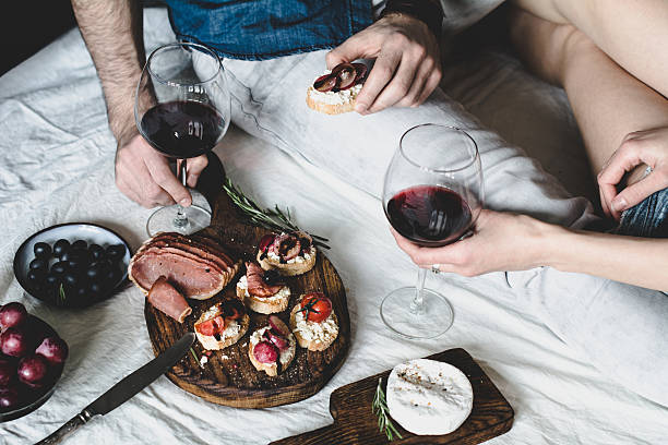 istock Couple eating dinner with wine 629692482