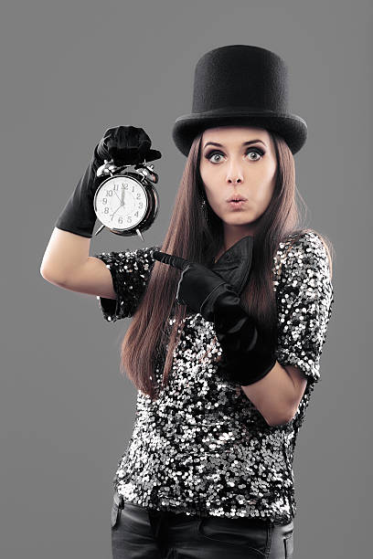 istock Surprised Woman with Alarm Clock on New Year 629694426