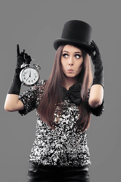 istock Surprised Woman with Alarm Clock on New Year 629694484