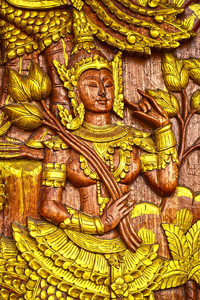istock Kinnaree carving on wood 629705828